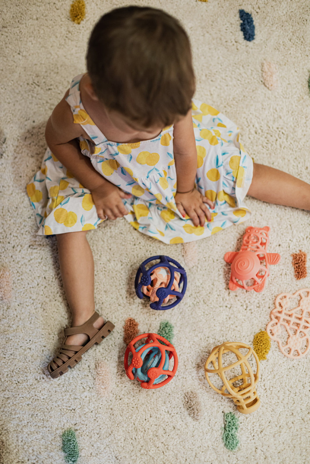 Little L Set van 2 sensorische ballen in oranje en blauw