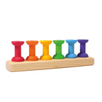 Grimm`s houten rijgspel met spoelen