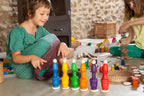 kind speelt met Grapat set van 6 Nins, mates en munten 