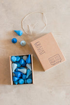 mandala regendruppels in de verpakking